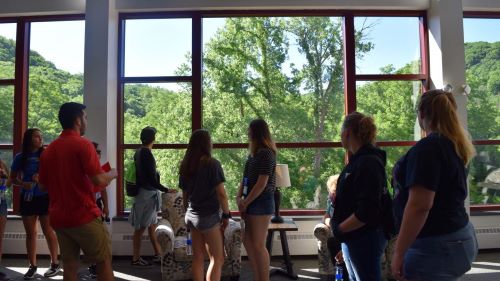 Students looking out of the window of University of Wisconsin- Eau Claire