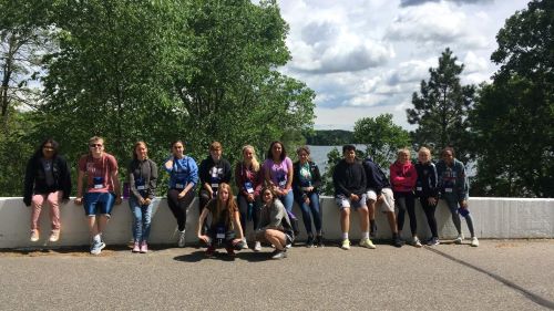 ETS Students posing by a lake