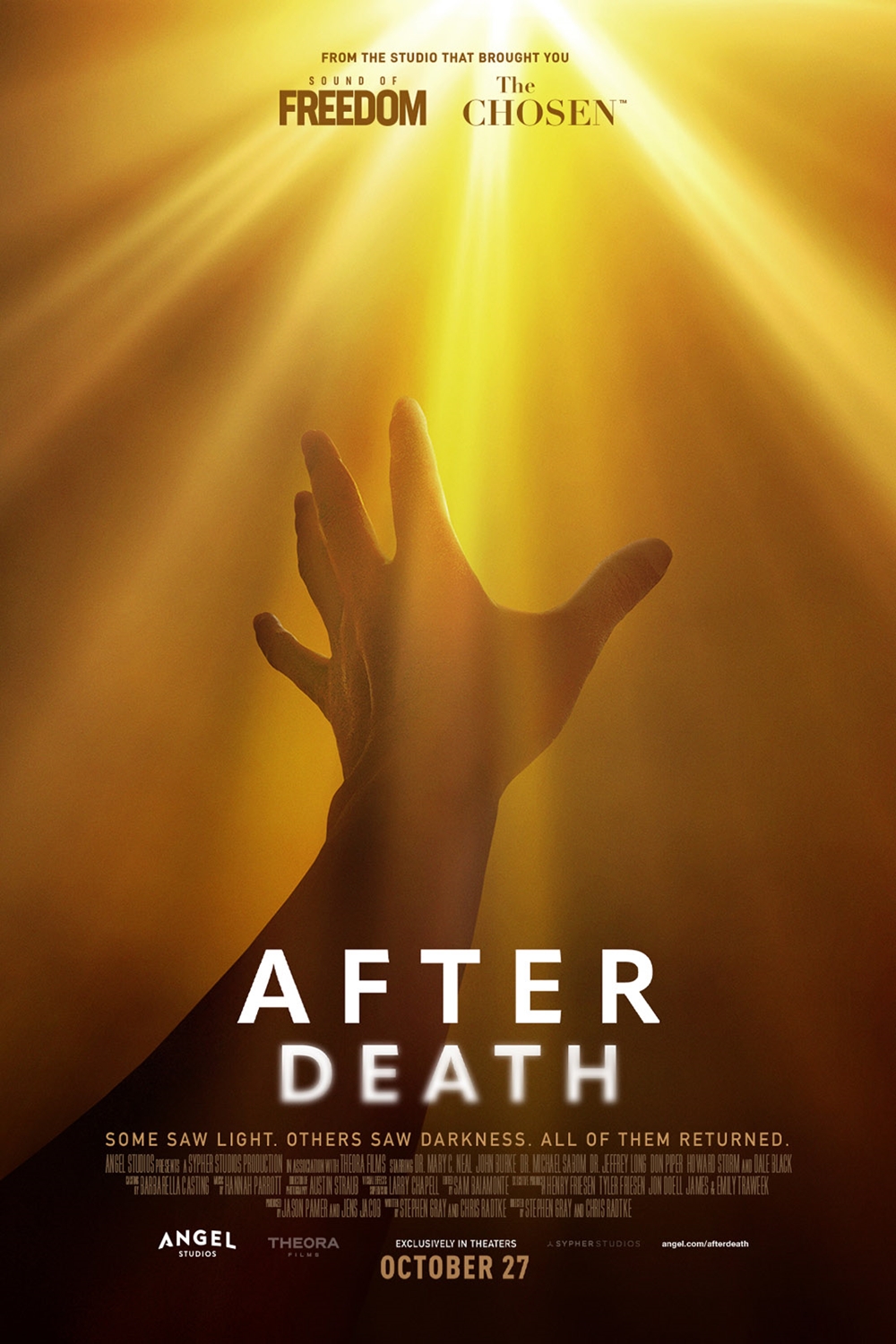 a hand reaching out to the light
