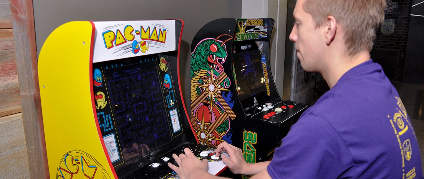 a student playing pac-man
