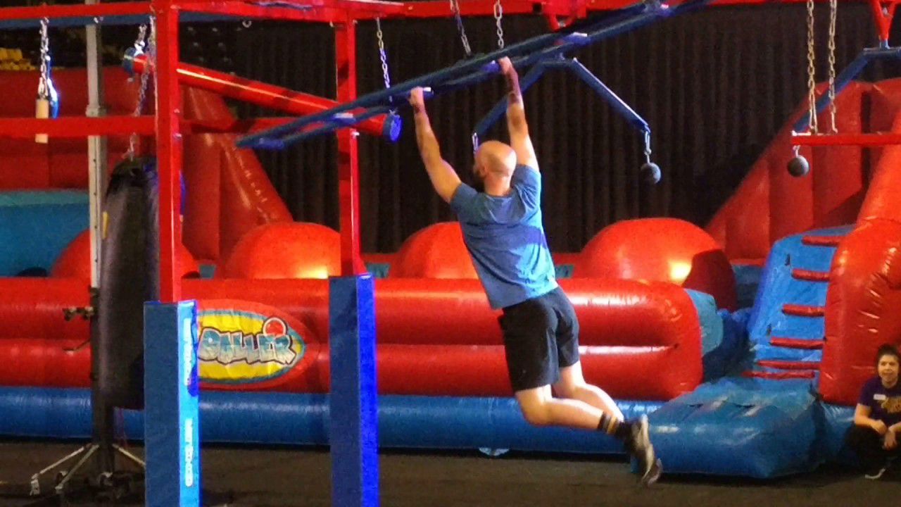 The inside course with a student on the monkey bars practicing for the Kato Ninja Warrior event