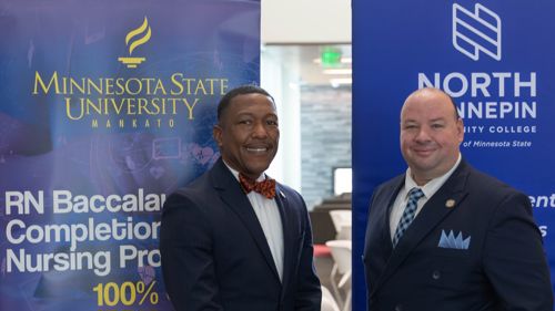 Minnesota State University, Mankato's provost and senior vice president for academic affairs David Hood on the left and North Hennepin Community College's president Rolando Garcia on the right are pictured at a Jan. 11, 2023 ceremony in Brooklyn Park, Minnesota