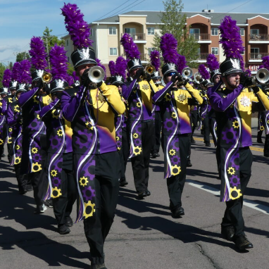 a group of people marching in a parade