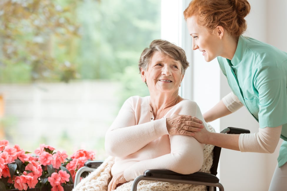 a person in a wheelchair smiling