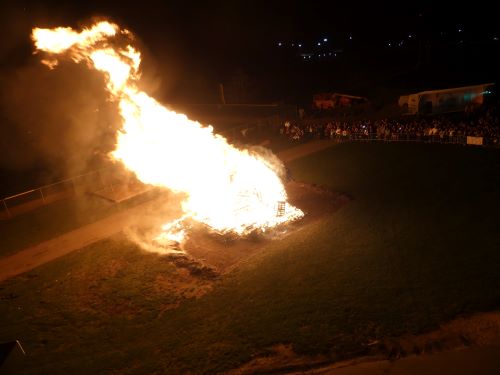 Traditional burning of large bonfire at Minnesota State University Mankato Homecoming