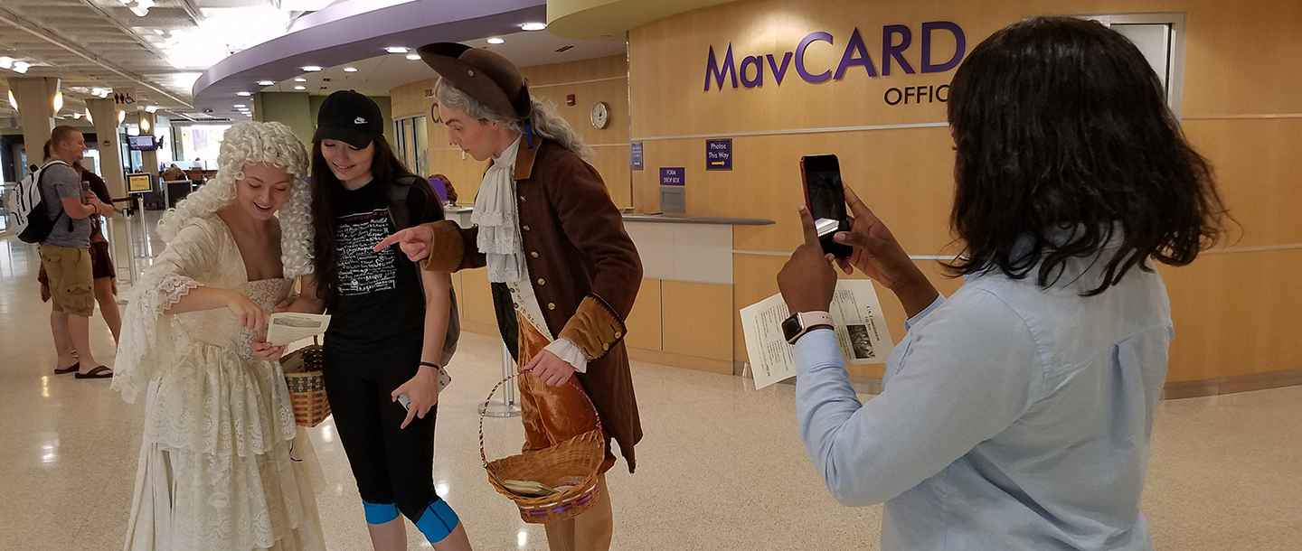 students dressed up as the founding fathers talking to students in the CSU on constitution day