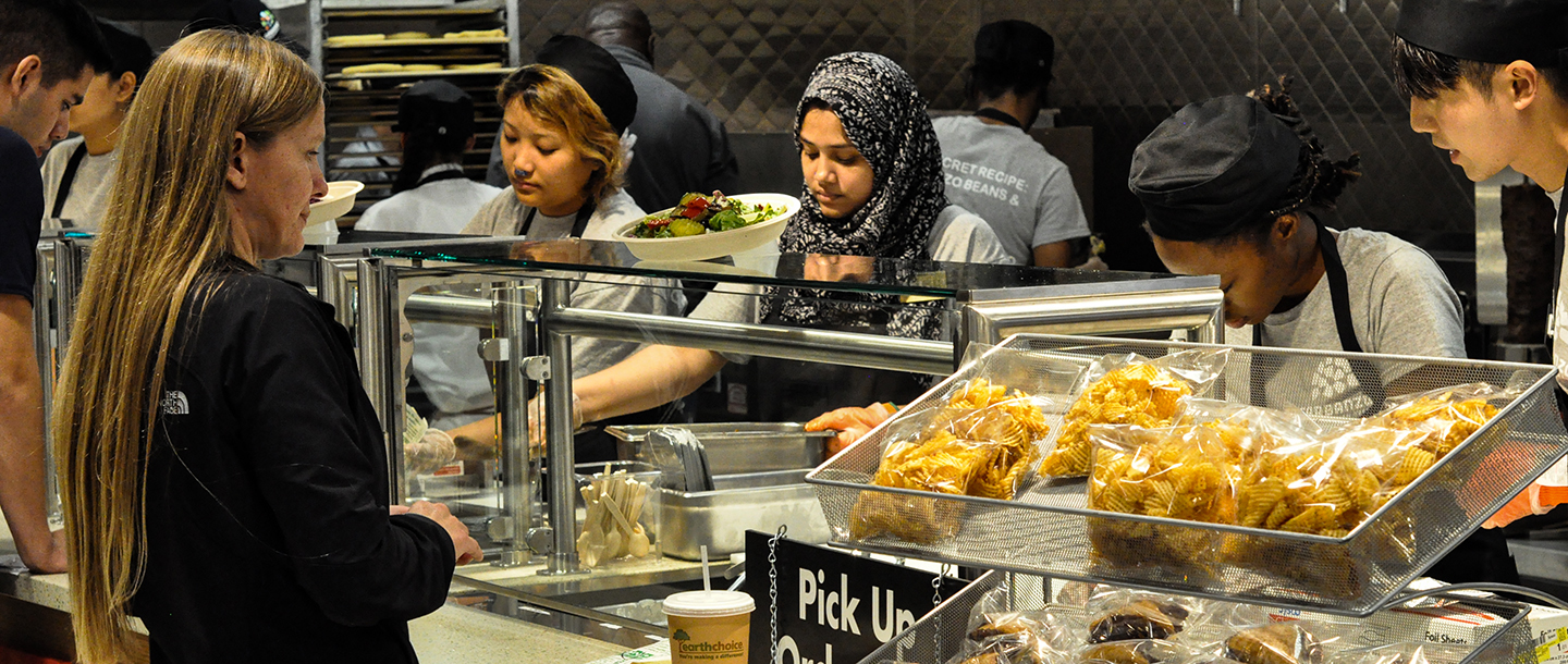 students serving food to other students at the CSU dining area