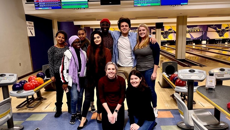 group of students posing for picture in the CSU bowling alley