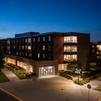 The Minnesota State University Preska Residence Community building at sunset