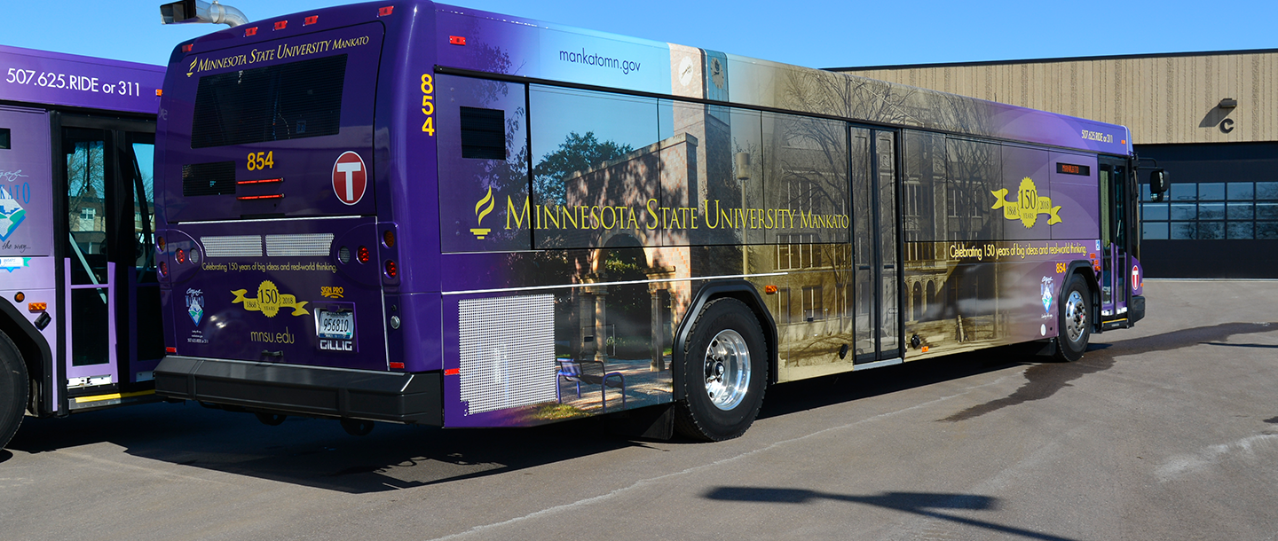 Mankato City buses with the Minnesota State University Mankato 150th anniversary logo wrap