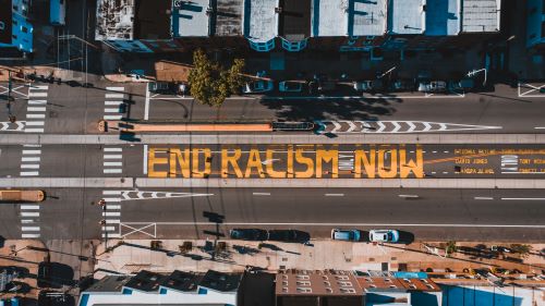 End Racism Now slogan painted on the road