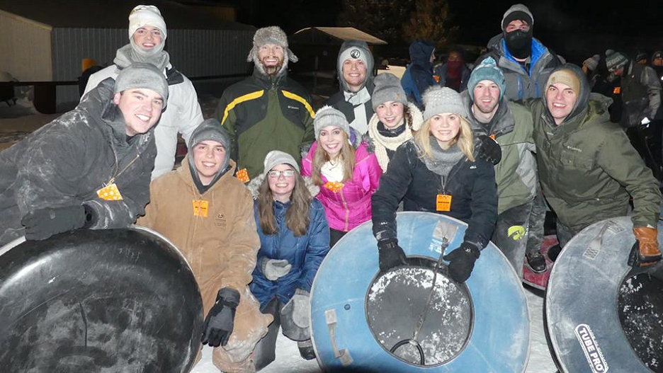 Students posing after snow tubing at mount kato