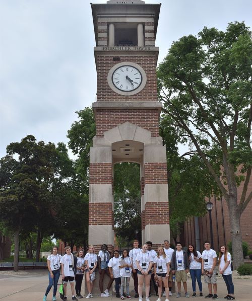 Educational Talent Search  students posing by the clock tower at UW - LaCrosse