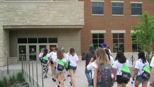 A group of Educational Talent Search students taking a tour outside of the University of Wisconsin La Crosse campus