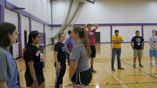 ETS students doing an activity in a gym