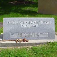 The Kent State - Jackson State Memorial stone on the northwest corner of Morris Hall states, "HATE, WAR, POVERTY AND RACISM ARE BURIED HERE"