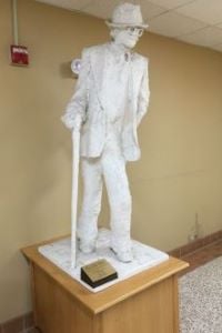 The statue of The Old Man in the halls of Wiecking Center