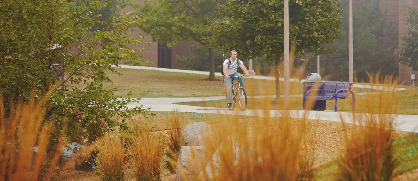 A boy bicycling at the trafton science center