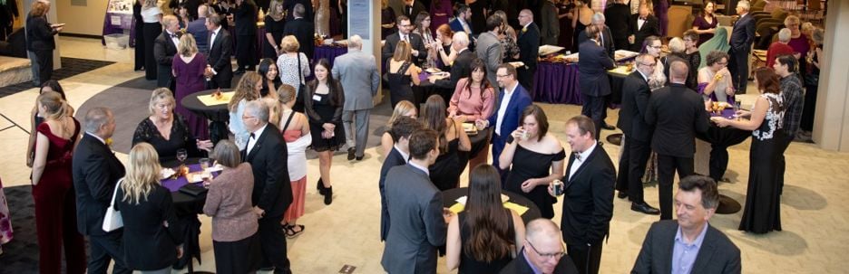 Social hour at the annual Purple and Gold Gala
