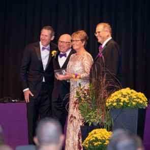 Honorees of the Year pose for a photo as they receive their awards