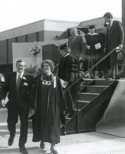 a group of people walking down stairs