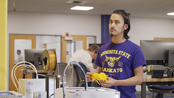 a person in a purple shirt