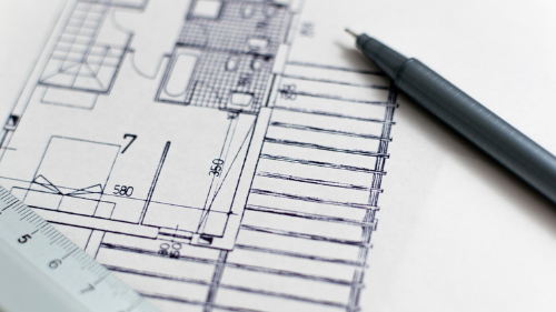 Blueprint with ruler and pen