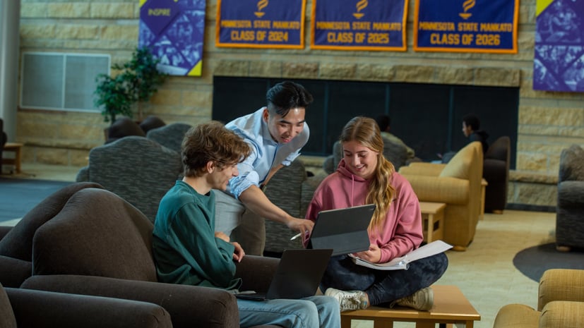 a group of people sitting on a couch