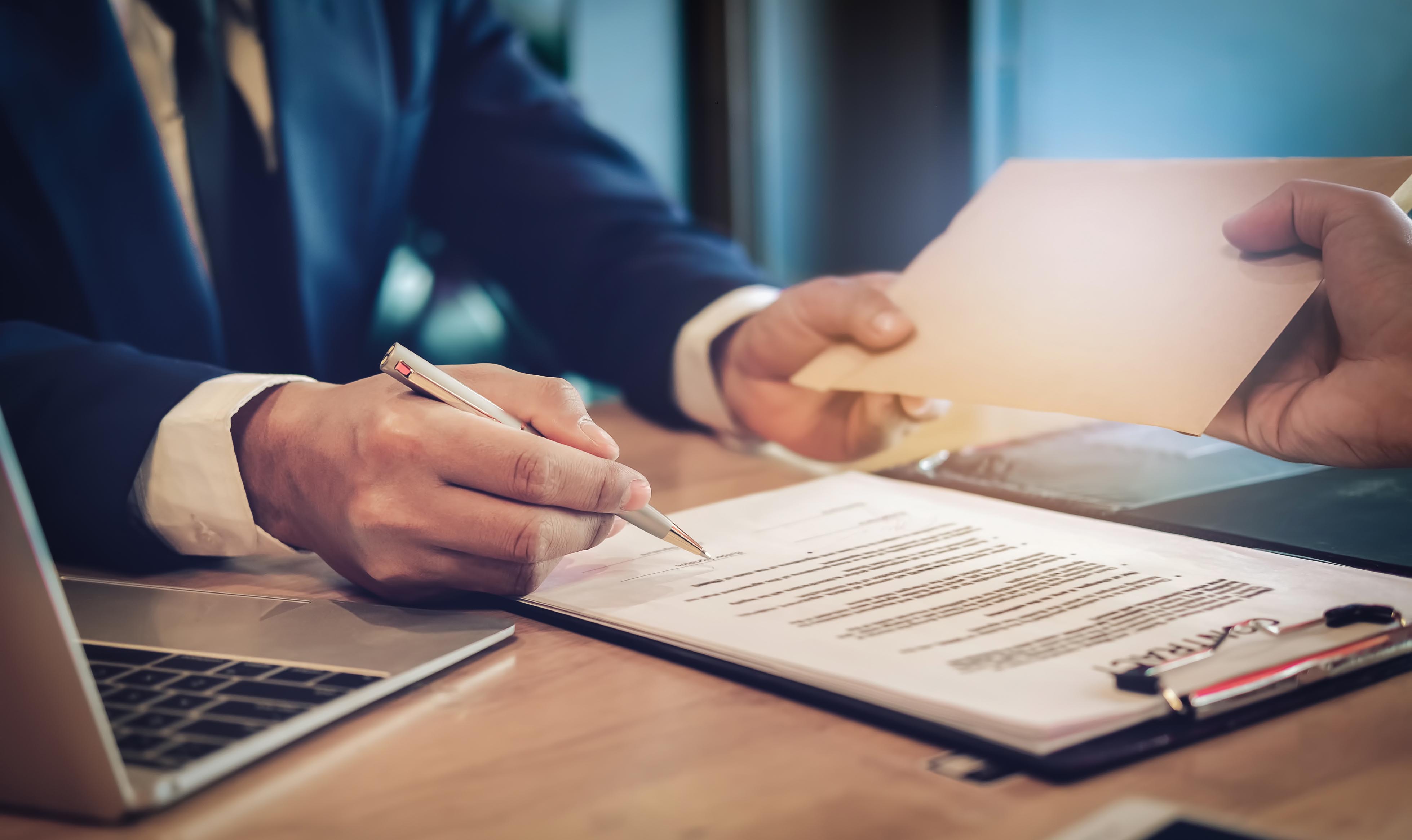 image of contract exchange paperwork