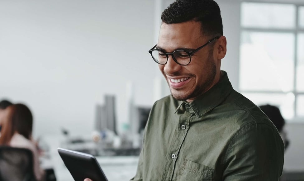 image of male looking at a device