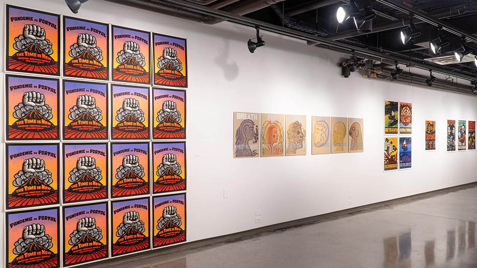 Art Gallery showcasing paintings along a white wall