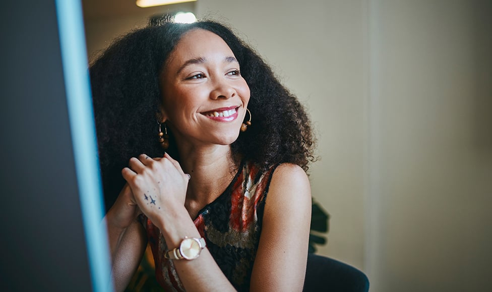 Woman smiling at camera.