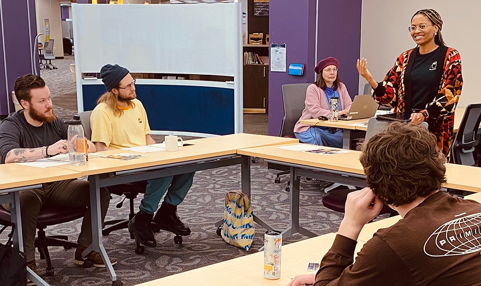 group of students discussing opportunities with Good Thunder Reading Series