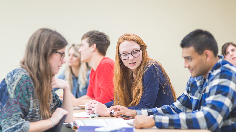 group of students brainstorming creative writing topics
