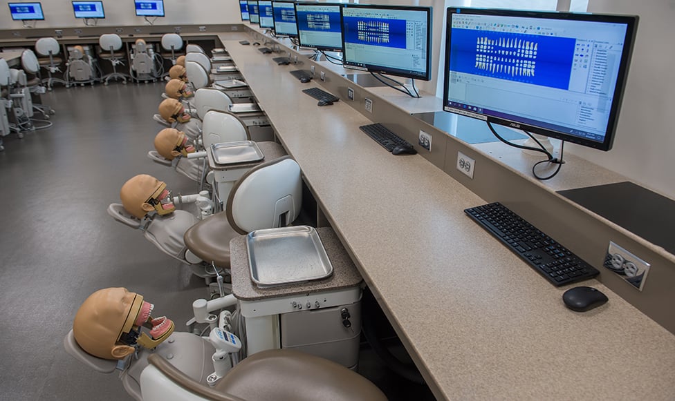 Dental Hygiene technology lab with patient simulations and tools