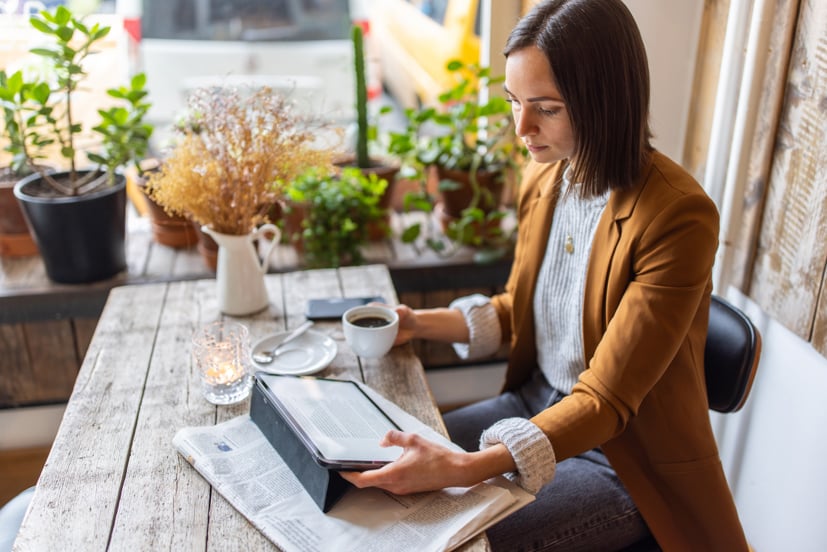 Woman reading on ipad.