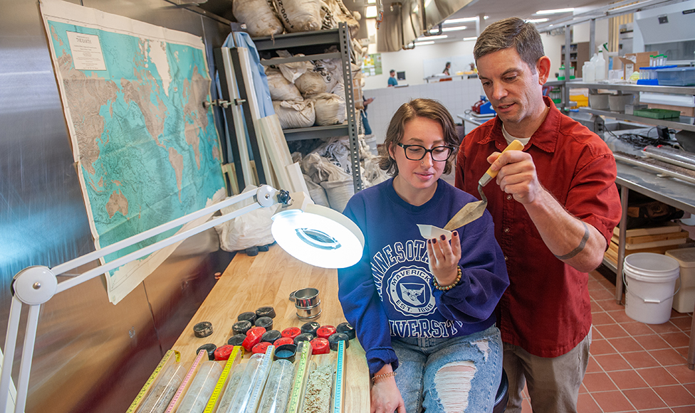 student and professor completing EARTH Systems Lab
