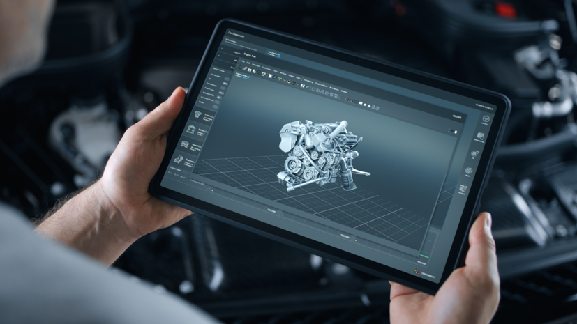 Person viewing a 3D model on ipad.