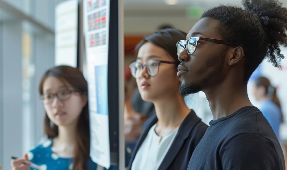 Students attentively listening to a speaker