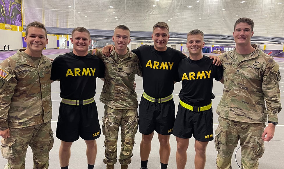 ROTC graduates standing together