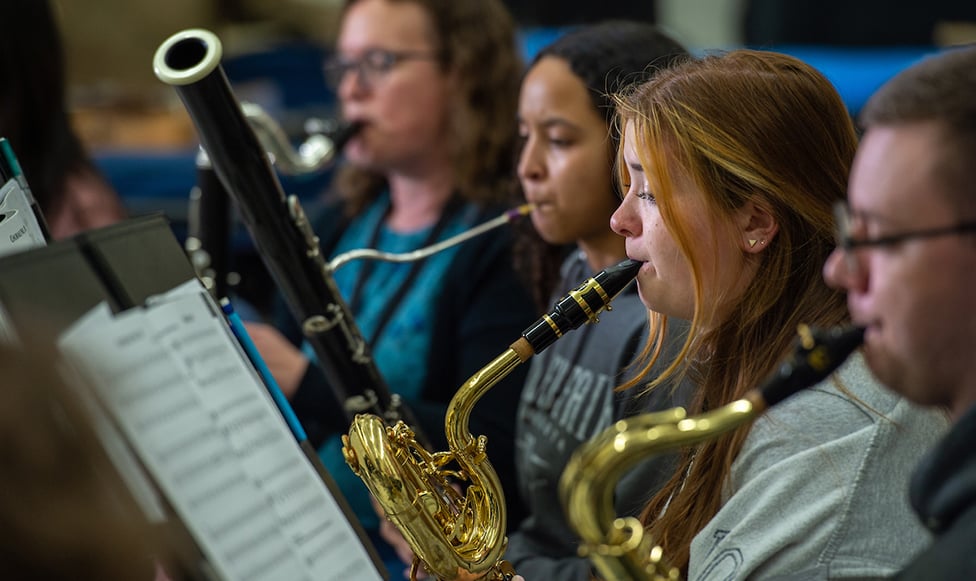 Students playing instruments.