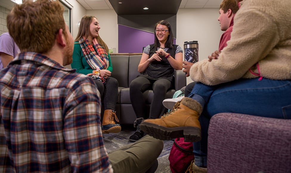 students hanging out in one of the Learning Community spaces