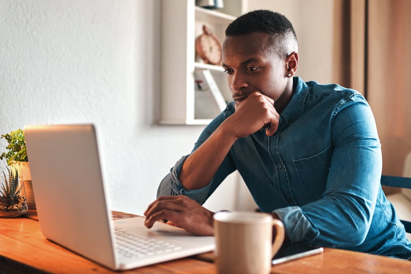 Man working on computer.