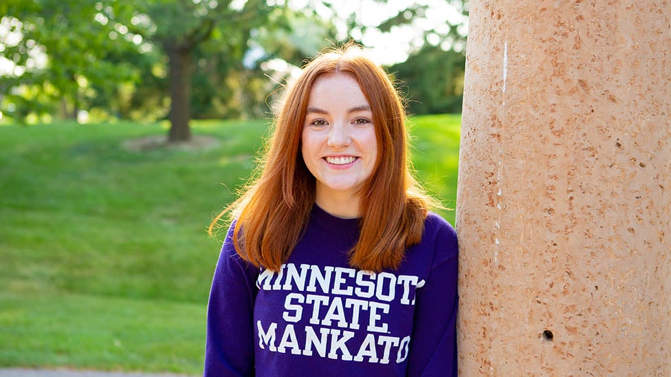 a person smiling at camera