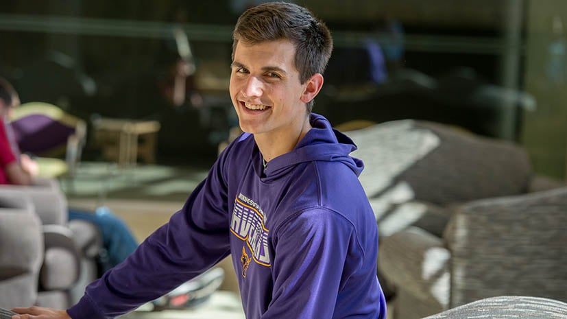 a person smiling at the camera