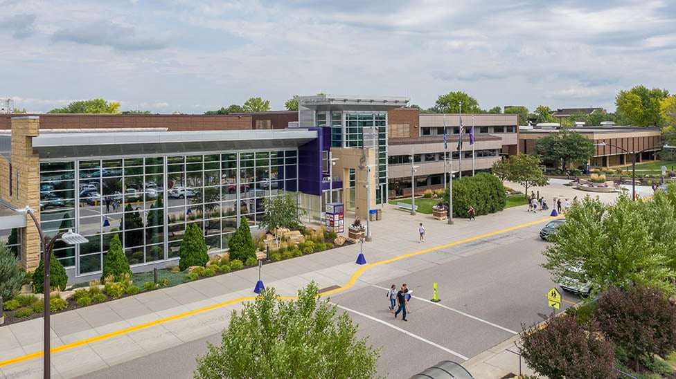 aerial view of people walking on campus safely