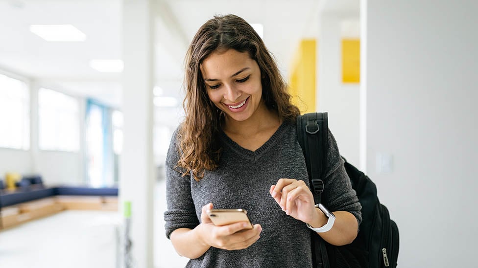 a person looking at a cellphone