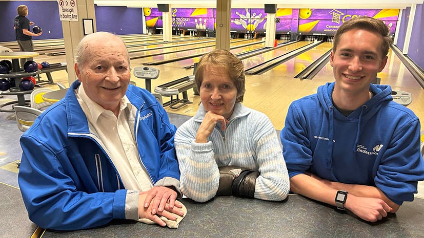 Murray and Mary Hanson with grandson Calvin in the Maverick Bullpen with the bowling alley in the background
