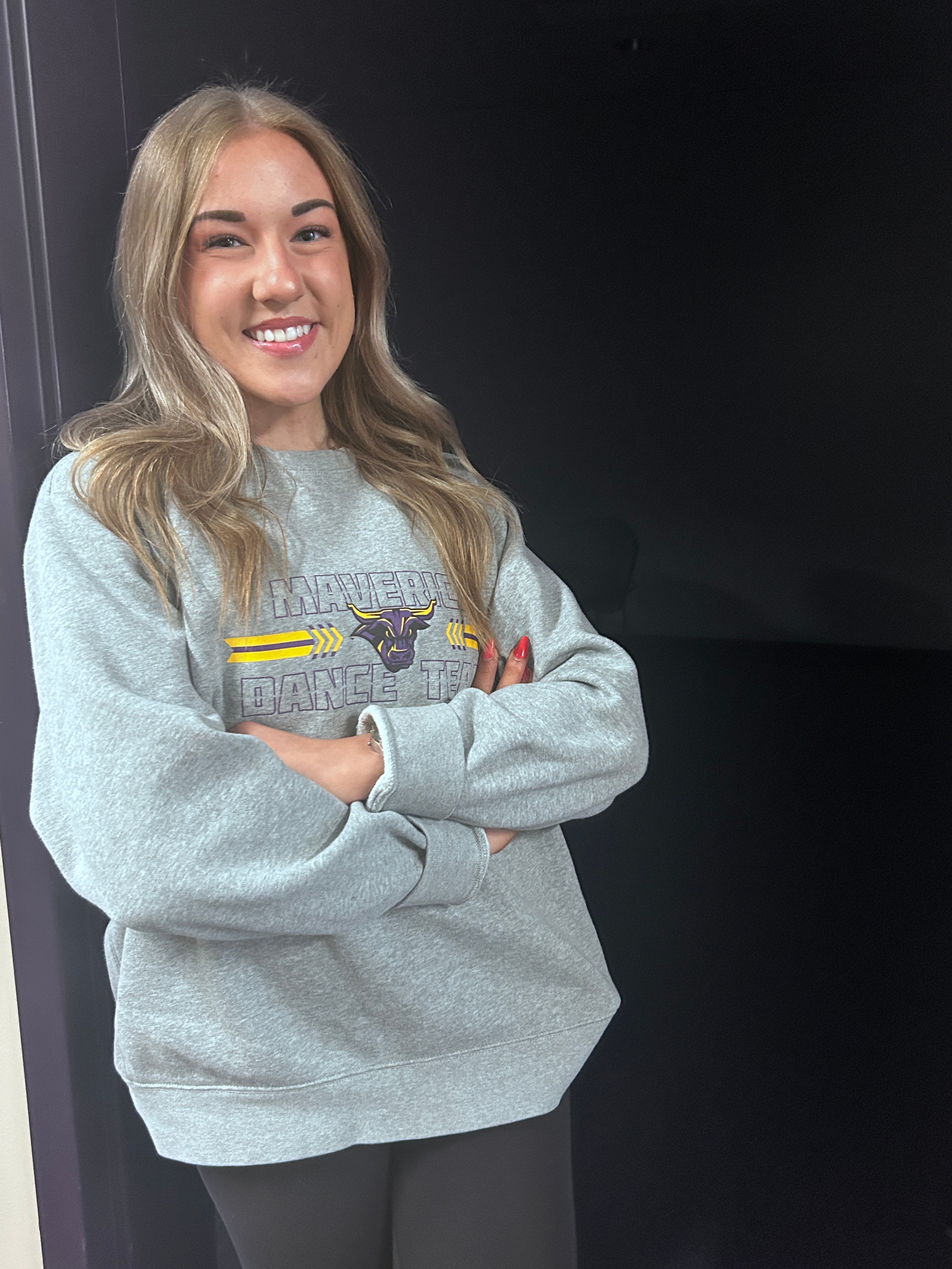 Kari Turner Posing as part of the Maverick Dance team