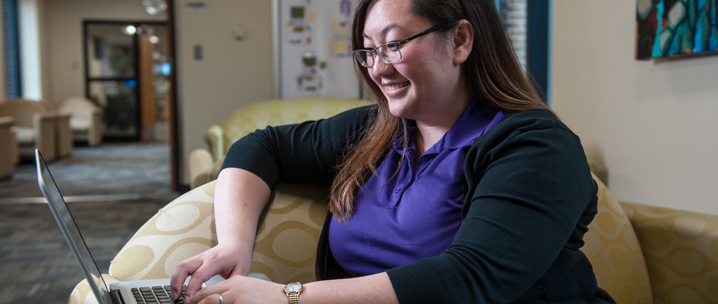 Woman taking class online